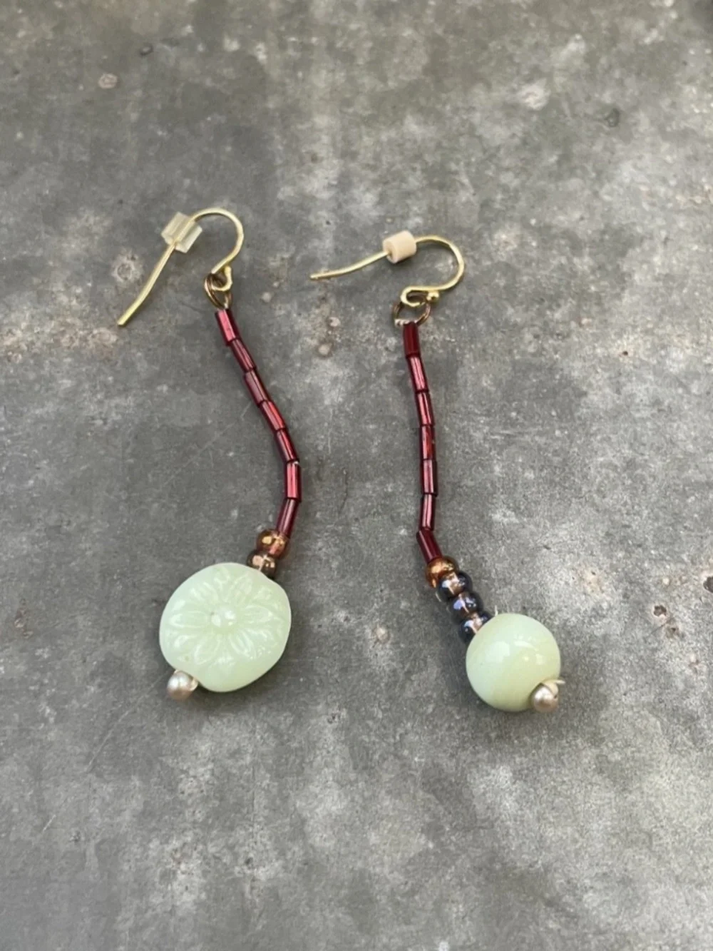 Artisan green and red beaded Drop Earrings with flower etching